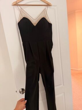 Black Embellished Yoke Jumpsuit with Sheer Neckline